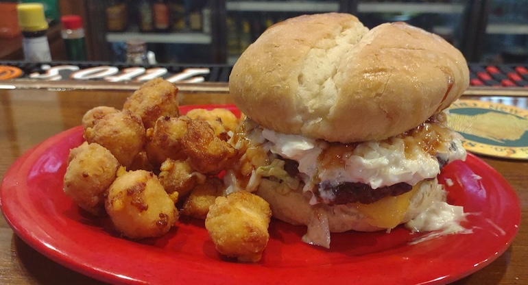 A burger with a side from Rally House Sports Bar.