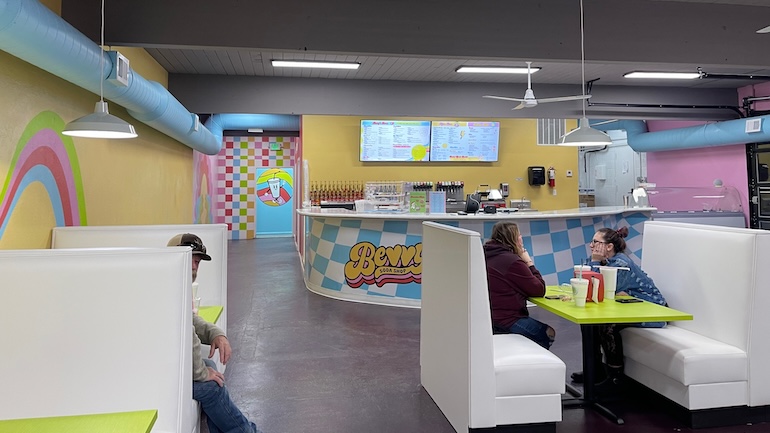 Image of the colorful interior of Bevvy's Soda Shop.